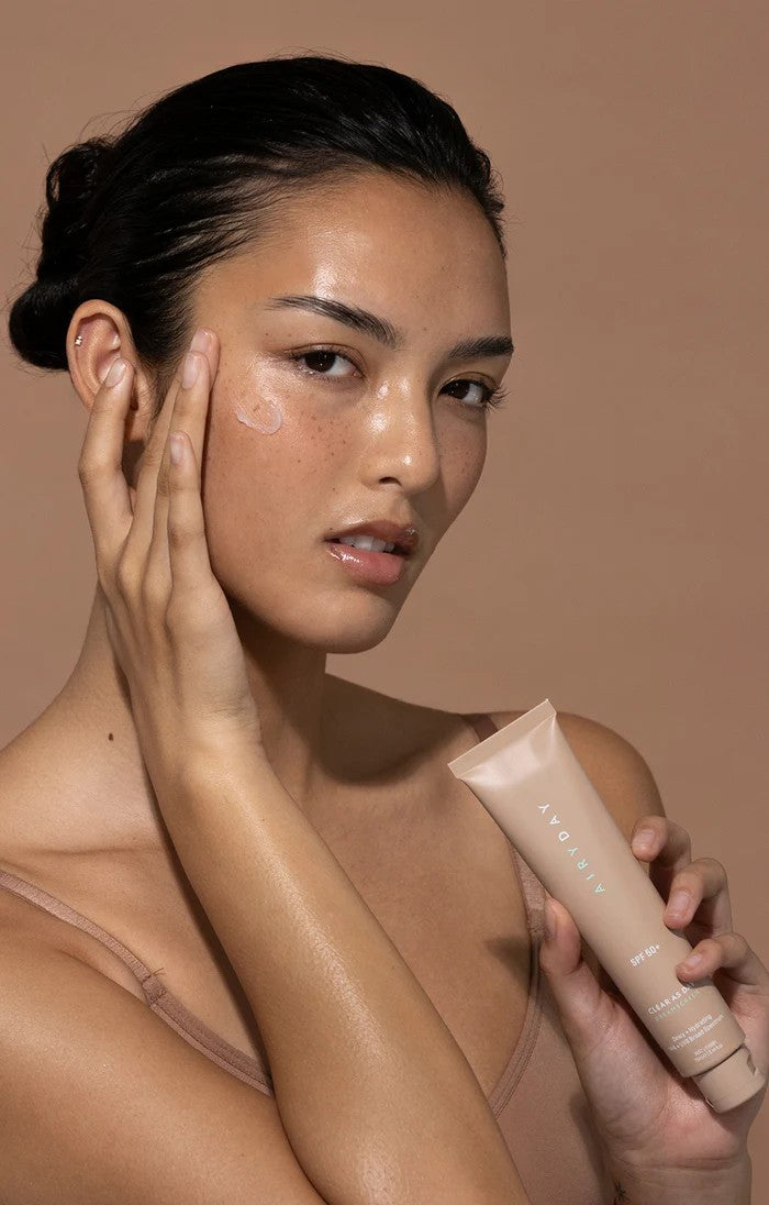 Clear as Day SPF50+ Dreamscreen 75ml woman with product