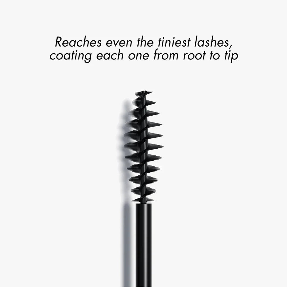Close-up of the Smooche Mascara brush applicator wand showing the lash-separating bristles.