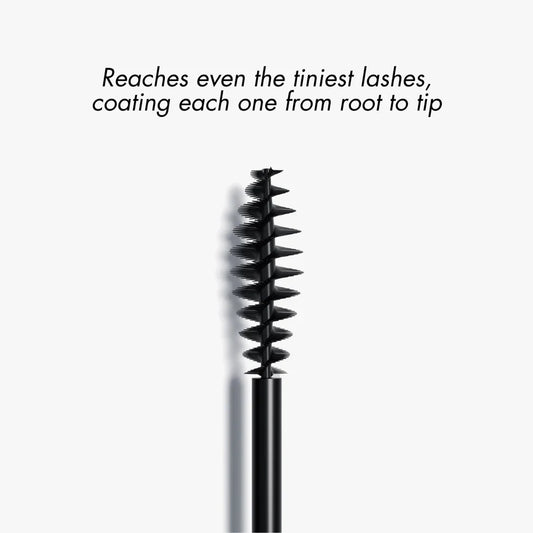 Close-up of the Smooche Mascara brush applicator wand showing the lash-separating bristles.